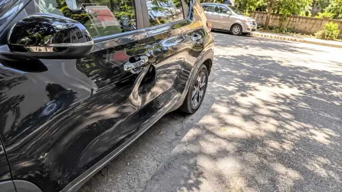 Screenshot of Siddharth Dialani's X post showing dent damage on the side of his car after the Bengaluru CEO road rage incident.