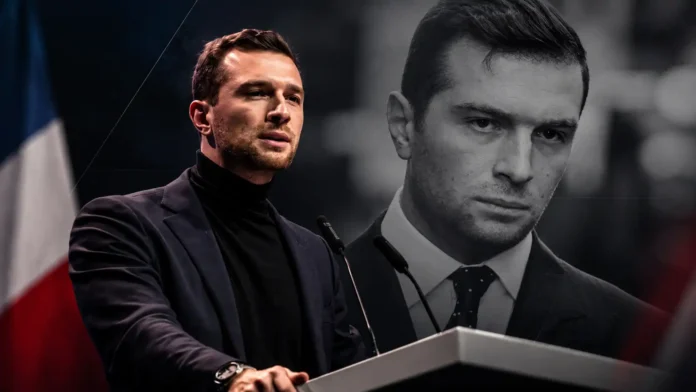 Jordan Bardella speaking at a podium amid Mediapart allegations over antisemitic comments